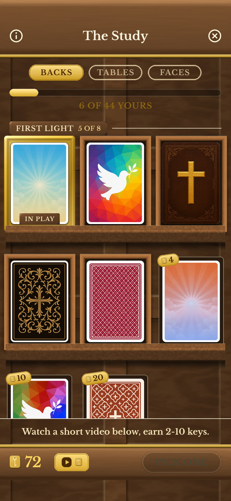 The Study displaying collectible Bible Solitaire card backs in wooden shelves.
